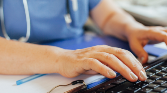 nurse-typing-on-keyboard