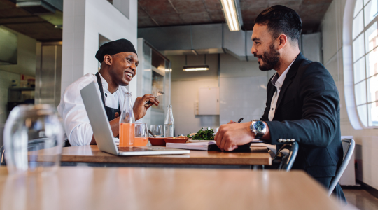 restaurant-owner-talking-with-business-advisor