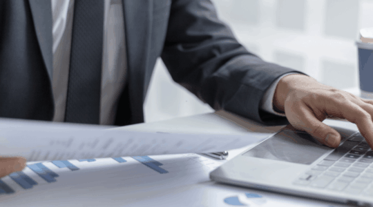 suit-man-desk-laptop