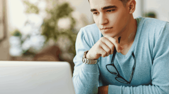 man-looking-at-laptop